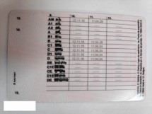Документ с таблицей и кодами, вероятно, идентификационная карточка