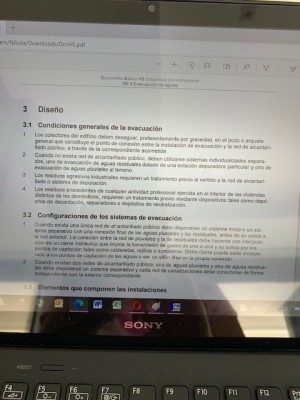 Текст на экране ноутбука с документом о проектировании систем эвакуации — CostaSpain.net Текст на экране ноутбука с документом о проектировании систем эвакуации