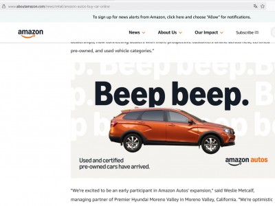 Оранжевый автомобиль на фоне текста о продаже машин