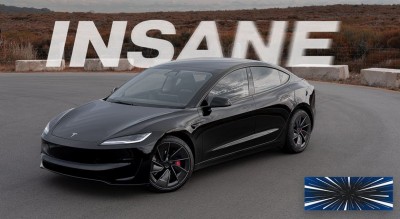 Чёрный электромобиль на дороге с текстом "INSANE" на фоне — CostaSpain.net Чёрный электромобиль на дороге с текстом "INSANE" на фоне