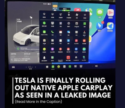Экран автомобиля Tesla с интерфейсом Apple CarPlay.
